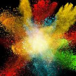 red yellow blue and green powder thrown in air
