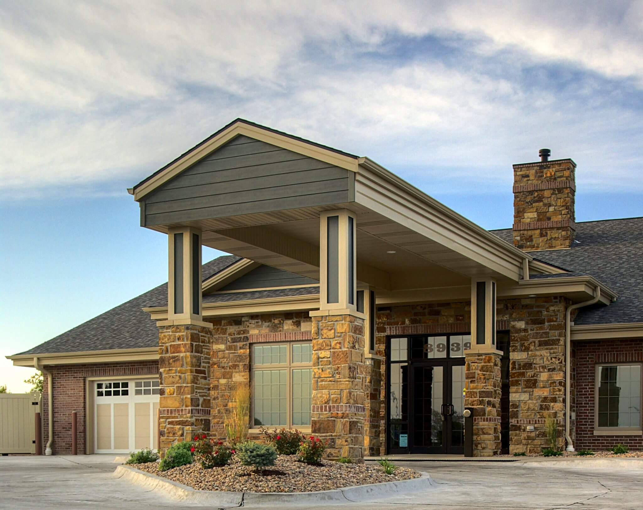 The Waterford Wilderness Hills Memory Care Facility exterior at sunset