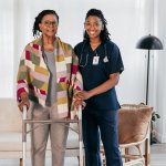 Cost of Memory Care exemplified by a kind CNA helping a memory care patient.