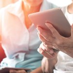 elderly people using tablet