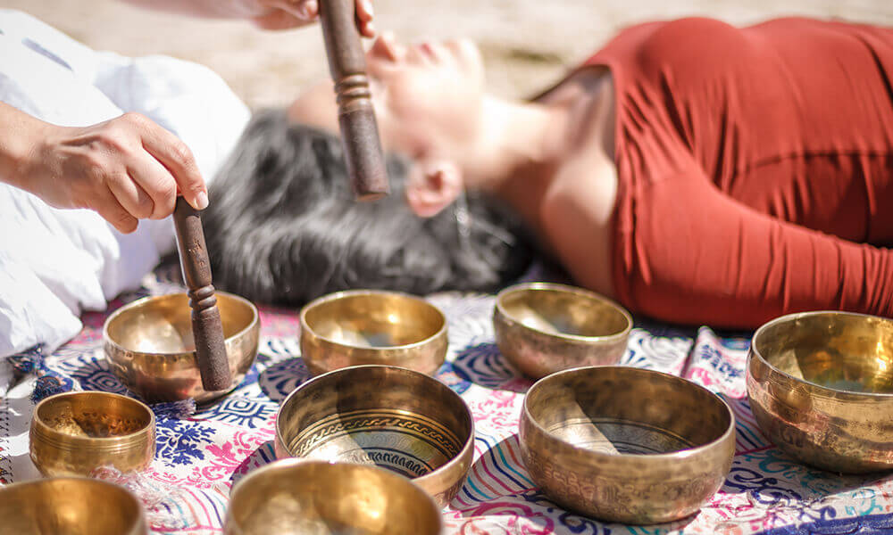 a woman receiving music therapy