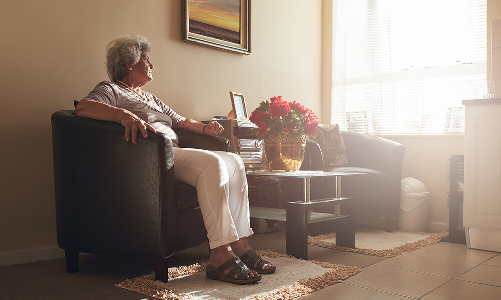 an elderly woman living at home