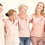 group of women celebrating breast cancer awareness month